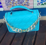 Bag with gold chain holder